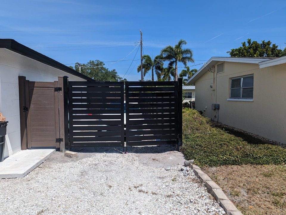 218' of 6' H Dark Walnut PVC Horizontal Privacy & A Custom 10' W Aluminum Slatted Driveway Gates - Photo 1