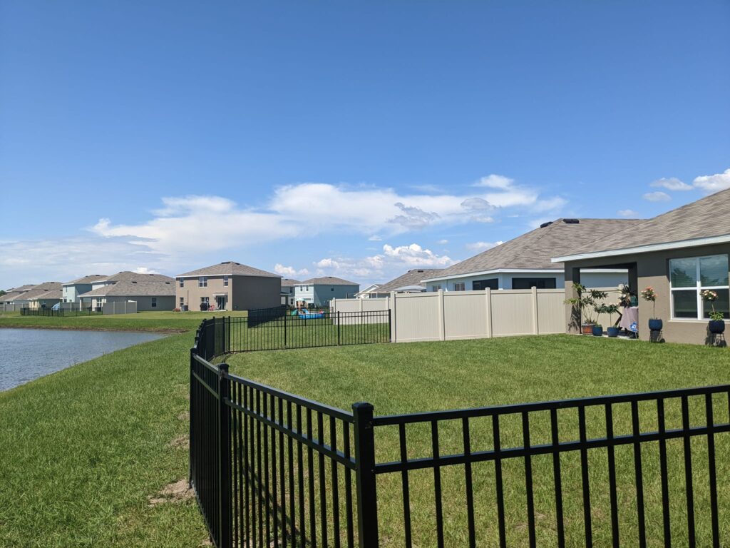 6' H Tan PVC Privacy & 4' H Black Aluminum 3-Rail - Photo 1