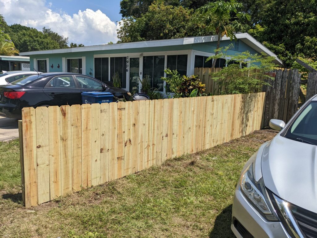 4' H Pressure Treated Wood Stockade - Photo 1