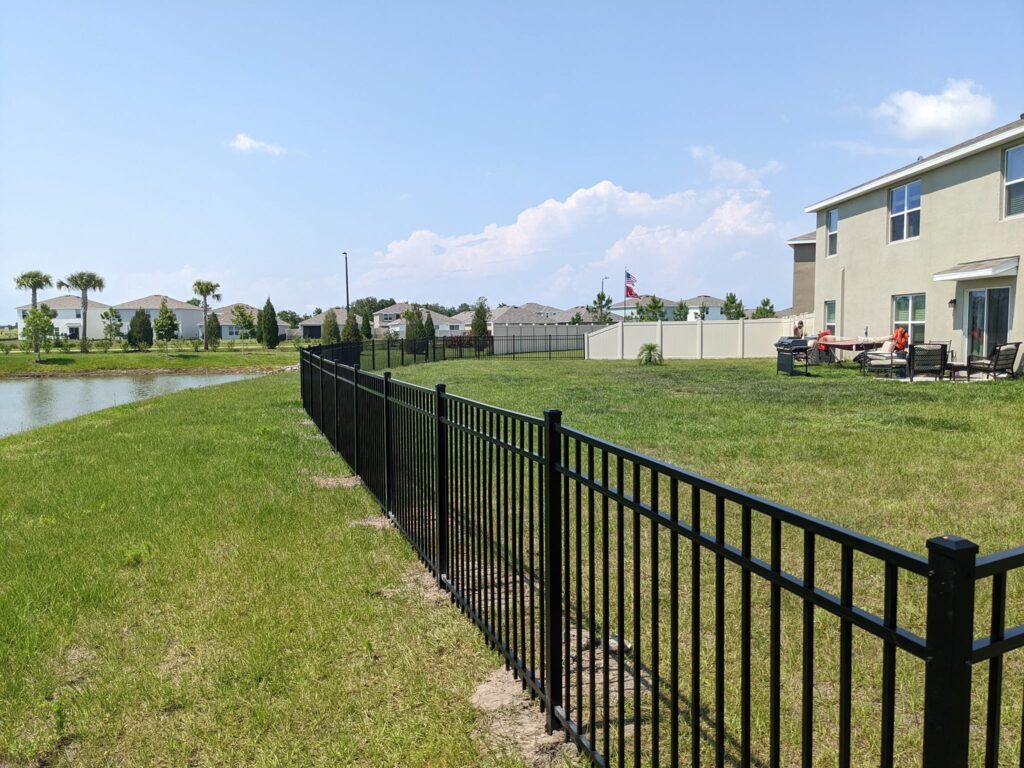 6' H Tan PVC Privacy & 4' H Black Aluminum 3-Rail - Photo 1