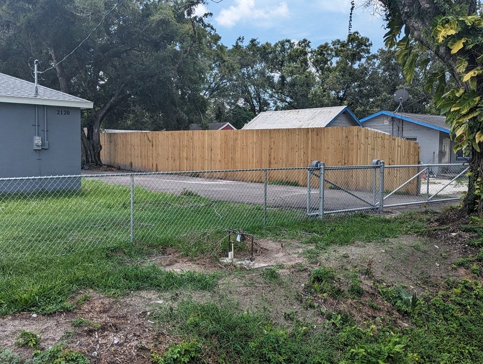 8' H Pressure Treated Wood Stockade & 4' H Galvanized Chain Link - Photo 1