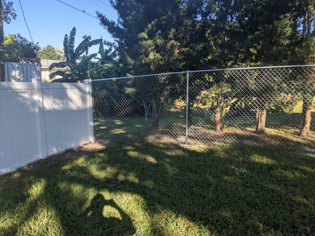 6' H White PVC Privacy & 6' H Galvanized Chain Link - Photo 1