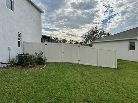 6' H Tan PVC Privacy & 4' H Black Aluminum 3-Rail - Photo 1